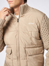 Man beige padded jacket with knitted braided sleeves