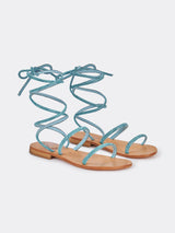 Wrap flat sandals with turquoise rhinestones