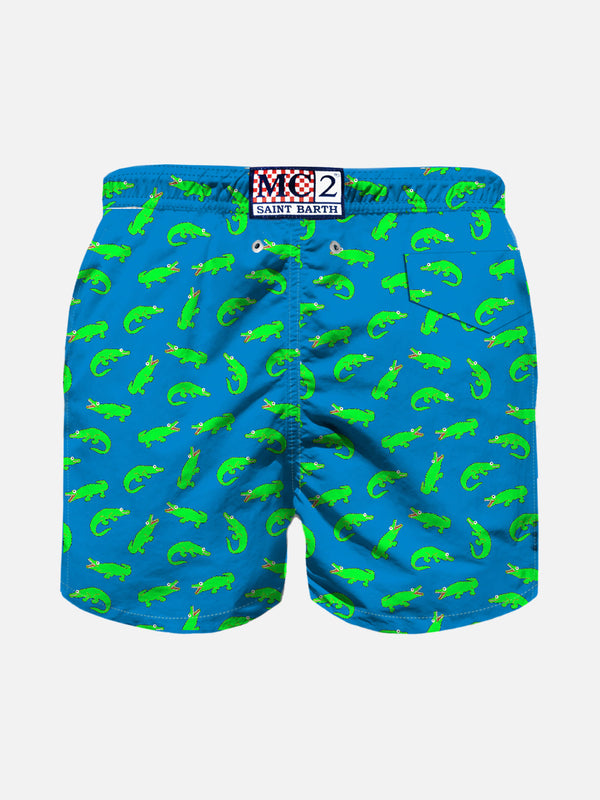 Boy bluette swim shorts with green alligator print