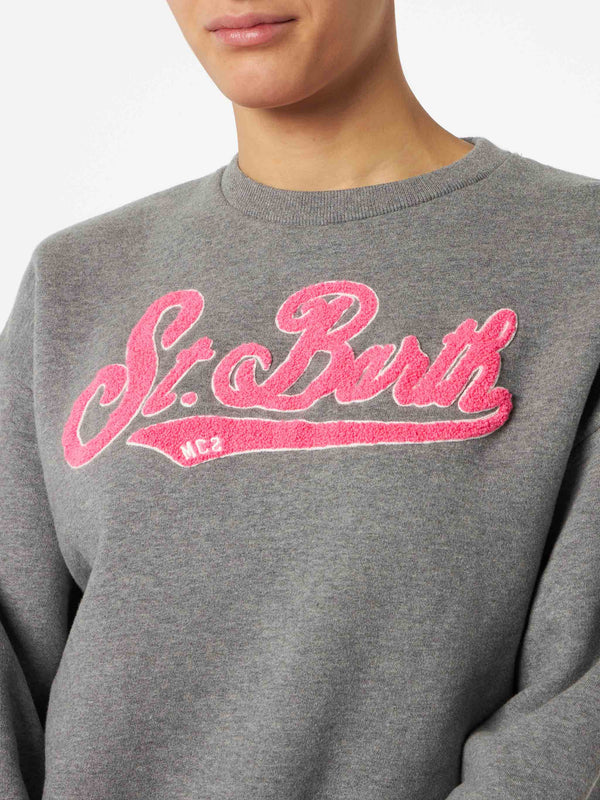 Woman fleece sweatshirt with pink terry logo