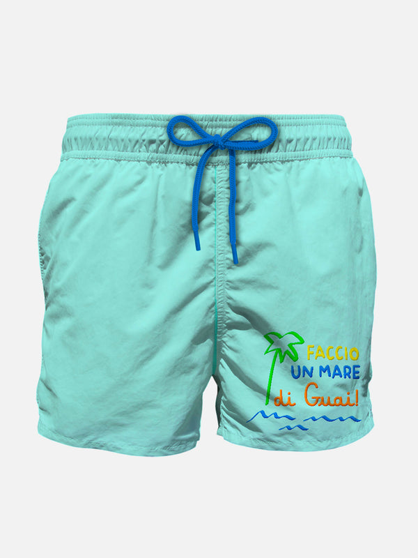 Boy swim shorts with Faccio un mare di guai! embroidery