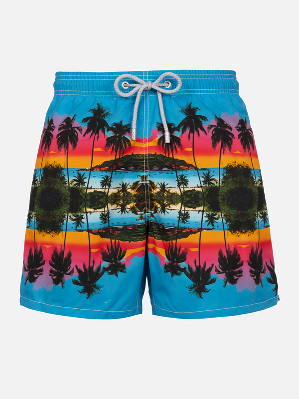Man mid-length Gustavia swim-shorts with palms landscape placed print  |  AI CO-CREATED DESIGN BY RICKDICK - POWERED BY RED-EYE