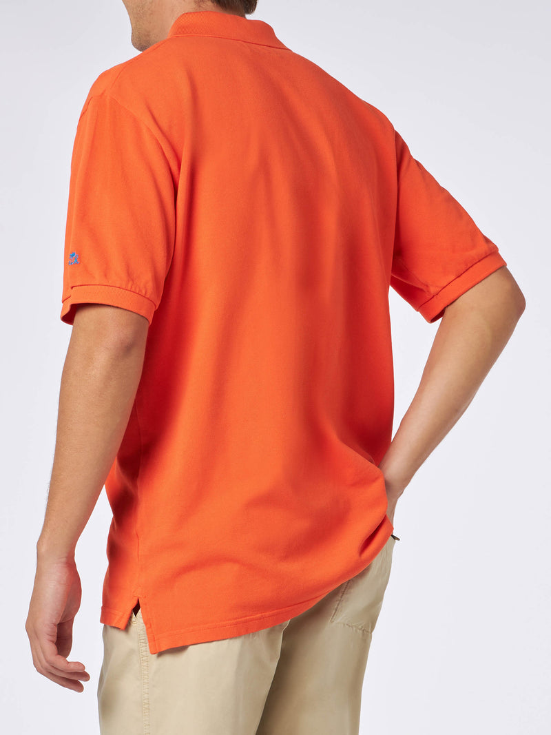 Man orange piquet polo with St. Barth logo and vintage effect