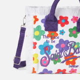 Colette-Handtasche aus Frottee mit mehrfarbigem Gänseblümchen-Print