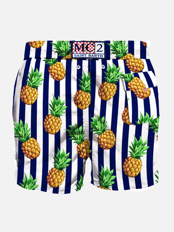 Striped swim shorts with pineapple print