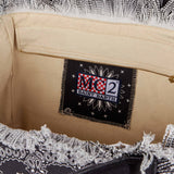 Vanity canvas shoulder bag with white bandanna print on black background