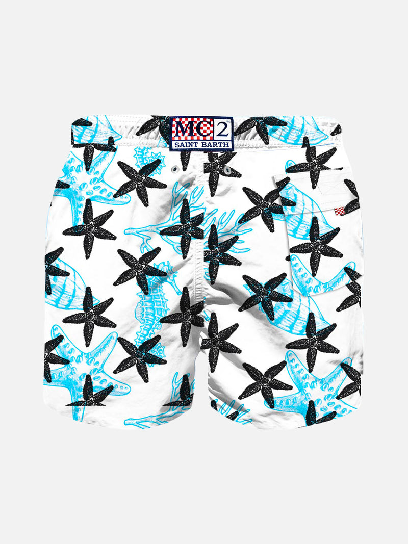 Boy swim shorts with flocked starfish print