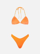 Woman fluo orange triangle bikini