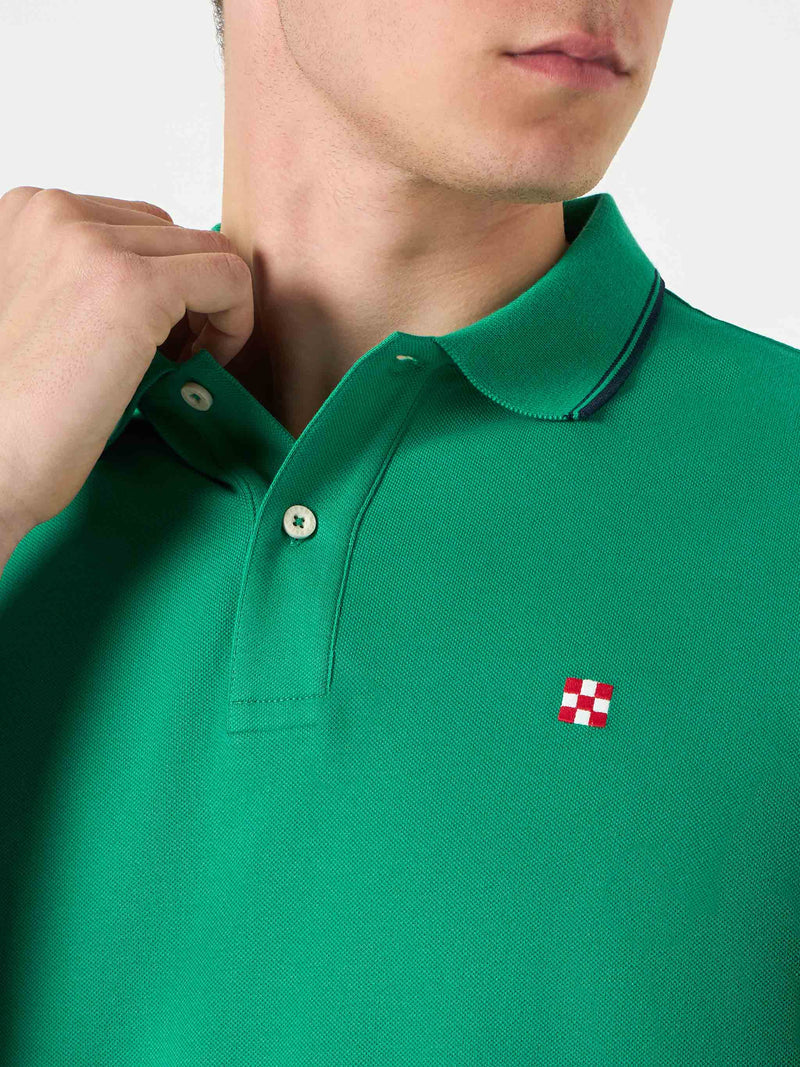 Green polo with St. Barth check logo