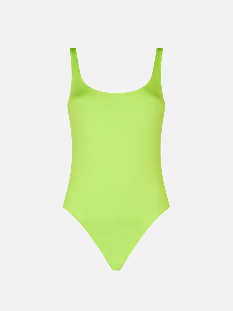 Woman lime one piece swimsuit