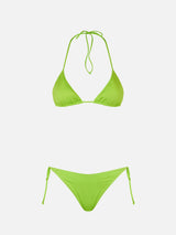 Woman lime green triangle bikini