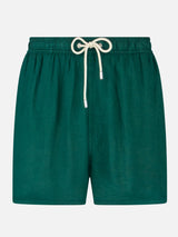 Pantaloncini da bagno in lino verde tinta unita di media lunghezza