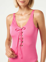 Woman pink one-piece swimsuit