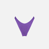 Woman purple crinkle cheeky swim briefs