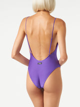 Woman purple one piece swimsuit