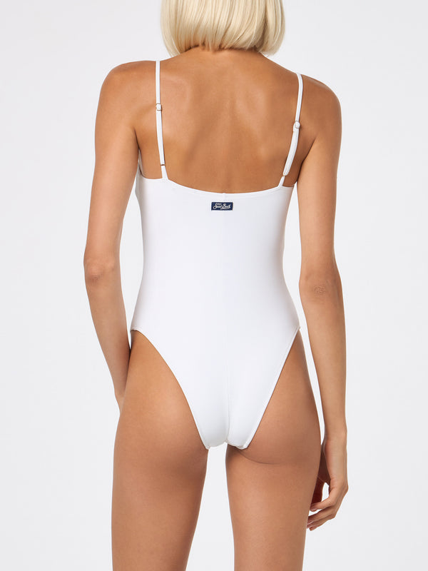 Woman white ribbed one piece swimsuit