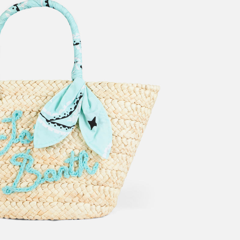 Straw bag with front embroidery and fabric handles