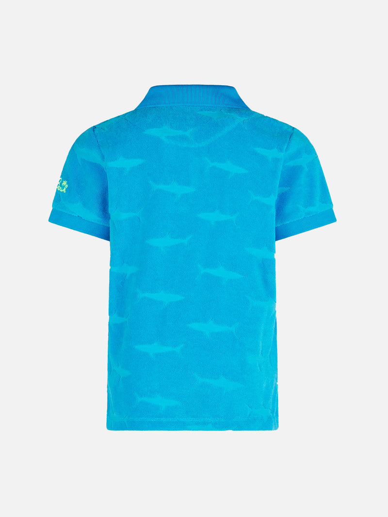 Blaues Jungen-Poloshirt mit aufgeprägten Haifischen aus Frottee