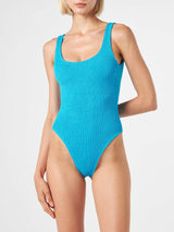 Woman light blue crinkle one piece swimsuit