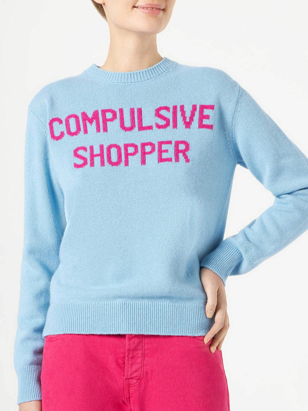 Woman crewneck light blue sweater with Compulsive Shopper print