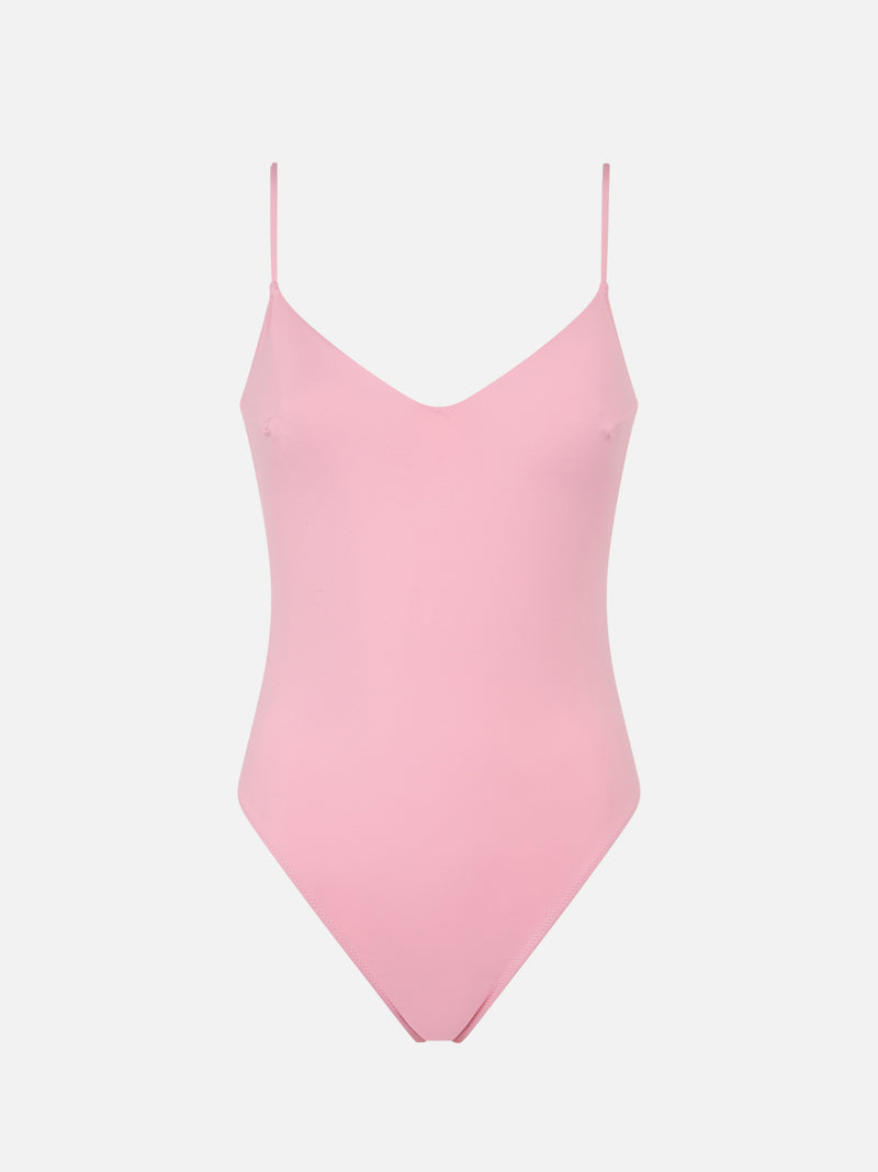 Woman pink one piece swimsuit