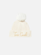 Woman white beanie with pompon