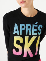 Woman black sweater Aprés Ski degrade writing