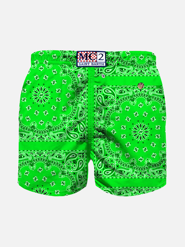 Boy fluo green swim shorts with bandanna print