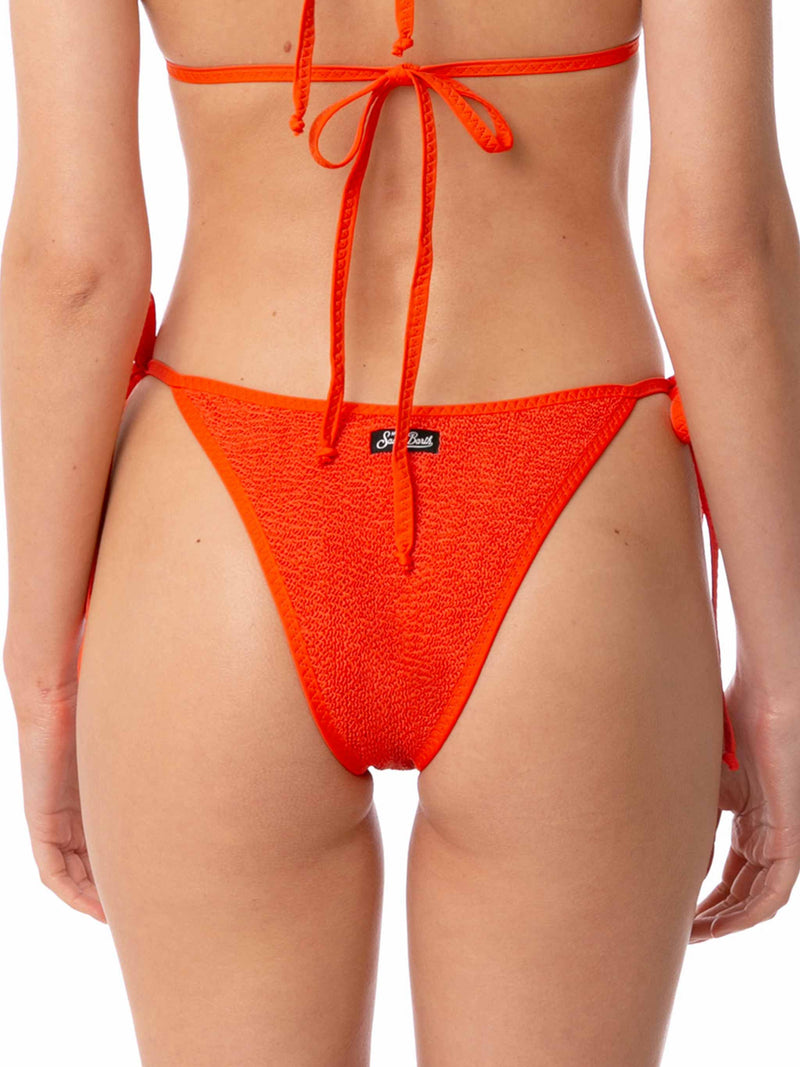 Woman crinkle orange swim briefs