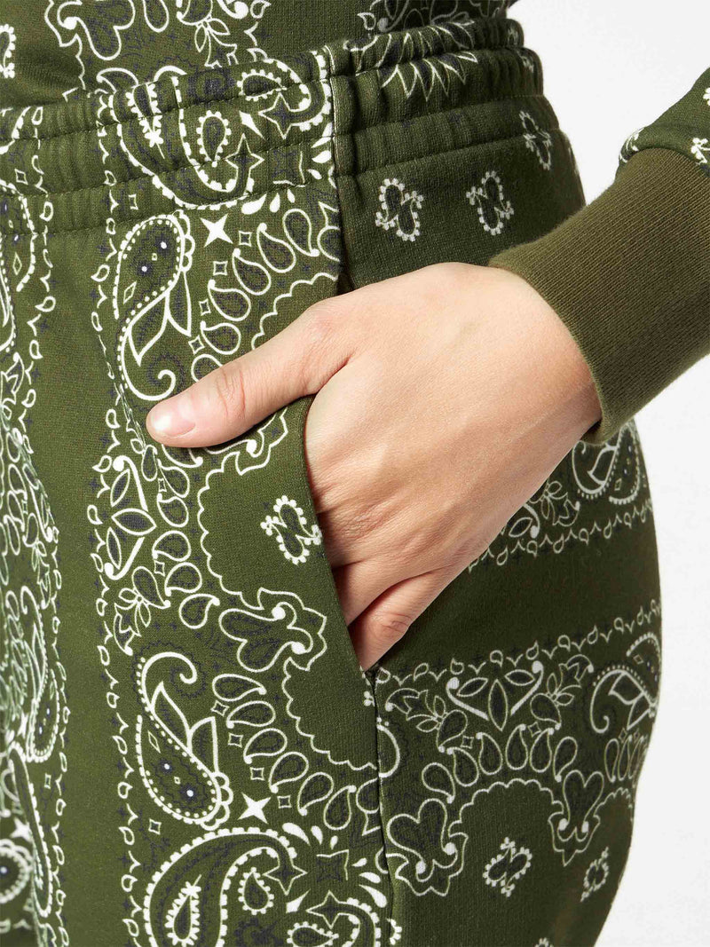 Woman fleece pants with green bandanna print