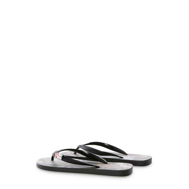Man flip flops with camouflage patch