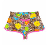 Girl beach shorts with daisy smile print