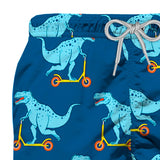 Costume da bagno da bambino in tessuto leggero con stampa Dinosauro su monopattino