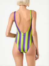 Woman lime and purple one piece swimsuit