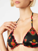 Woman triangle top swimsuit with heart print