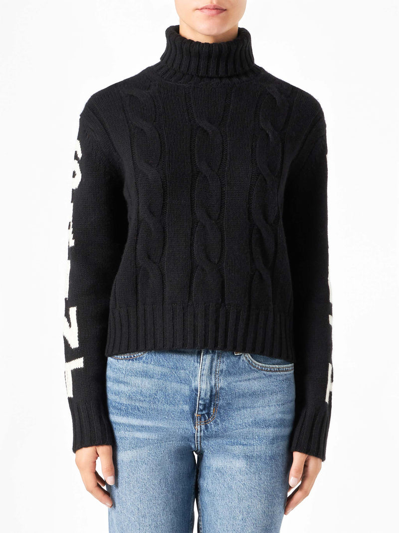 Woman black turtleneck braided sweater