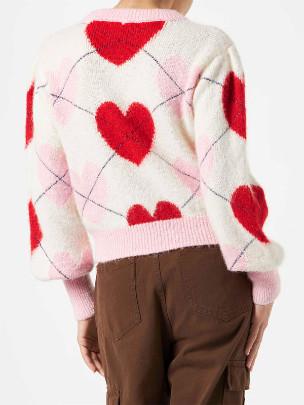 Woman brushed striped sweater with heart pattern