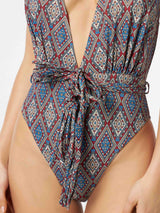 Woman one piece knitted swimsuit with ethnic print