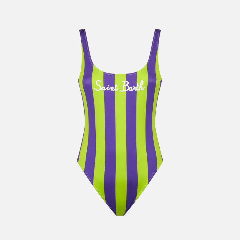 Woman lime and purple one piece swimsuit