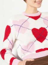 Woman brushed cropped sweater with heart pattern