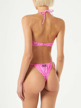 Woman pink bandeau bikini with bandanna print