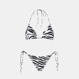Woman triangle bikini with zebra print